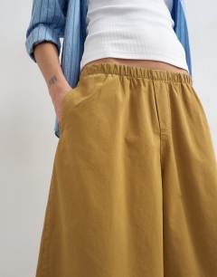 Model wearing A line culotte in tan