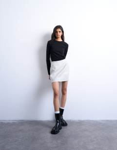 Model wearing A line mini skirt in grey