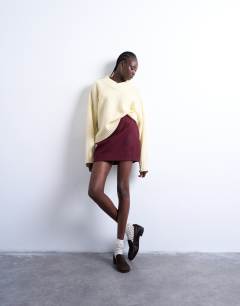 Model wearing A line mini skirt in port royale