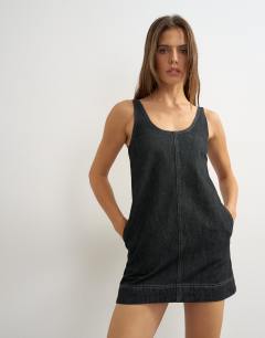 Model wearing A-line scoop mini dress in black rinse