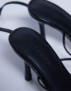 Model wearing Abbie strappy heeled sandal in black