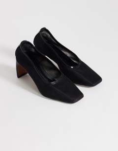 Model wearing Abbigail mesh heeled court shoe in black
