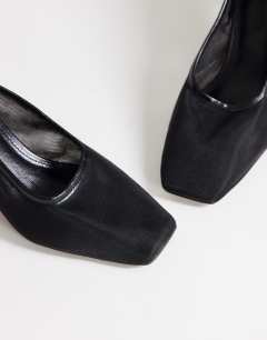 Model wearing Abbigail mesh heeled court shoe in black