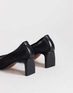 Model wearing Abbigail mesh heeled court shoe in black