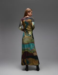 Model wearing Abstract print long sleeve maxi dress in multi