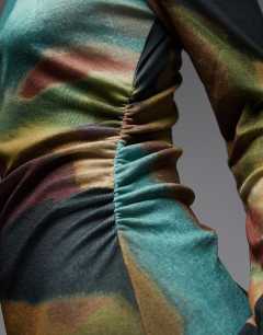 Model wearing Abstract print long sleeve maxi dress in multi
