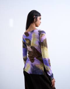 Model wearing Abstract print long sleeve top in purple