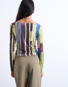 Model wearing Abstract stripe print microfibre long sleeve top in multi