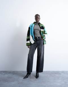 Model wearing Abstract trend printed borg fleece jacket in multi