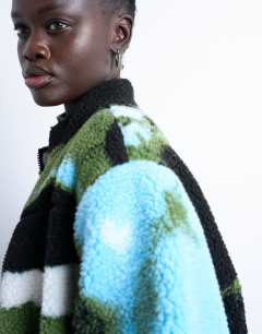 Model wearing Abstract trend printed borg fleece jacket in multi
