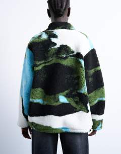 Model wearing Abstract trend printed borg fleece jacket in multi