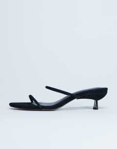 Model wearing Ada real suede kitten heel mule in black