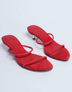 Model wearing Ada suede kitten heel mule in red