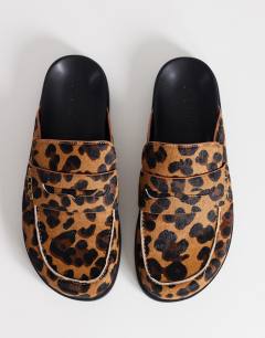 Model wearing Addie hair on real leather mule loafer in leopard print