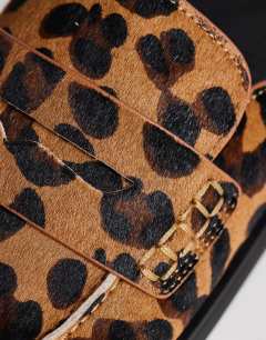 Model wearing Addie hair on real leather mule loafer in leopard print