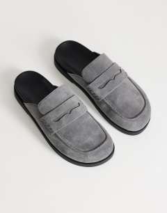 Model wearing Addie real suede mule loafer in grey