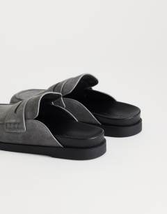 Model wearing Addie real suede mule loafer in grey