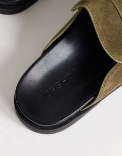 Model wearing Addie real suede mule loafer in khaki