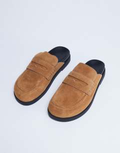 Model wearing Addie real suede mule loafer in tan