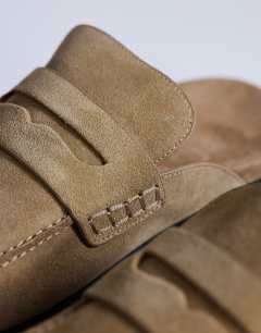 Model wearing Addie real suede mule loafer in taupe