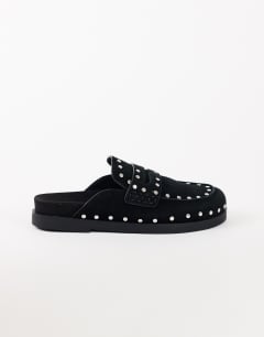 Model wearing Addie real suede studded mule loafer in black