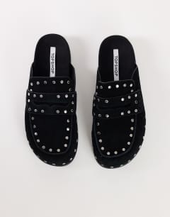 Model wearing Addie real suede studded mule loafer in black