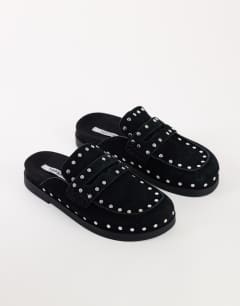 Model wearing Addie real suede studded mule loafer in black