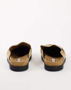Model wearing Addie real suede studded mule loafer in taupe