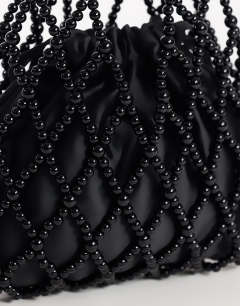 Model wearing Adele small diamond bead grab bag in black
