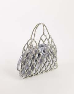 Model wearing Adele small diamond bead grab bag in silver