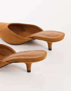Model wearing Adeline kitten heel court shoe in chestnut faux suede