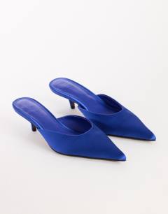 Model wearing Adeline kitten heel court shoe in cobalt satin