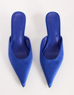 Model wearing Adeline kitten heel court shoe in cobalt satin