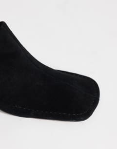 Model wearing Alberto real leather wide block heel mule in black