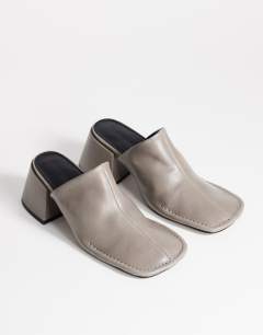 Model wearing Alberto real leather wide block heel mule in grey