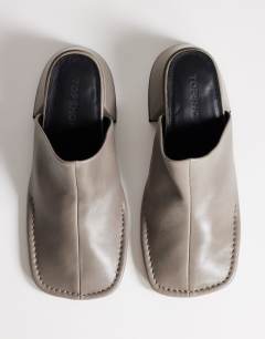 Model wearing Alberto real leather wide block heel mule in grey