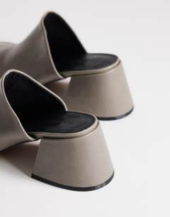 Model wearing Alberto real leather wide block heel mule in grey