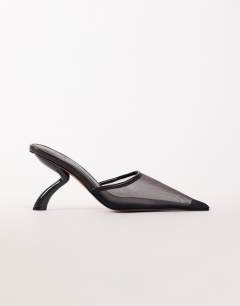 Model wearing Alessio angular heel pointed court shoe in chocolate mesh