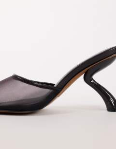Model wearing Alessio angular heel pointed court shoe in chocolate mesh