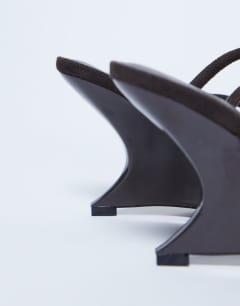 Model wearing Alexa sculptured wedge sandal in chocolate