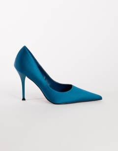 Model wearing Alexander high heel court shoe in teal satin