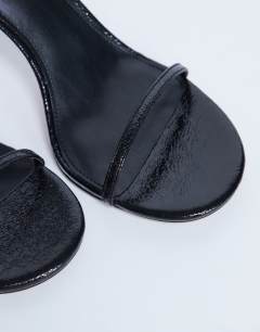 Model wearing Alexi 2 part heeled sandal in black