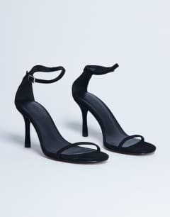 Model wearing Alexi real suede 2 part heeled sandal in black