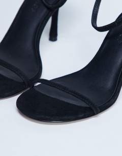 Model wearing Alexi real suede 2 part heeled sandal in black