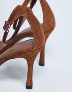 Model wearing Alexi real suede 2 part heeled sandal in camel