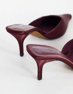 Model wearing Alfie pointed heeled court in aubergine satin