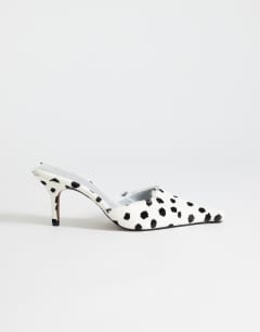 Model wearing Alfie real hair on leather pointed heeled court in dalmatian