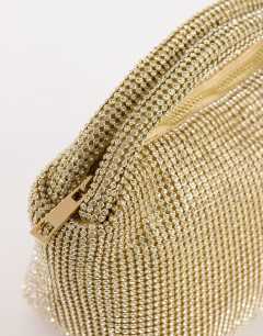 Model wearing Ammie small embellished grab bag in gold
