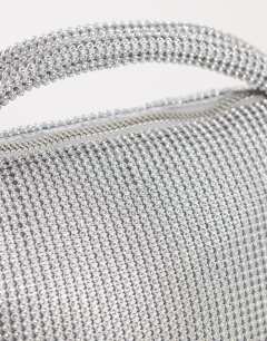 Model wearing Ammie small embellished grab bag in silver