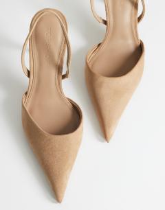 Model wearing Angel faux suede heeled court shoe in taupe